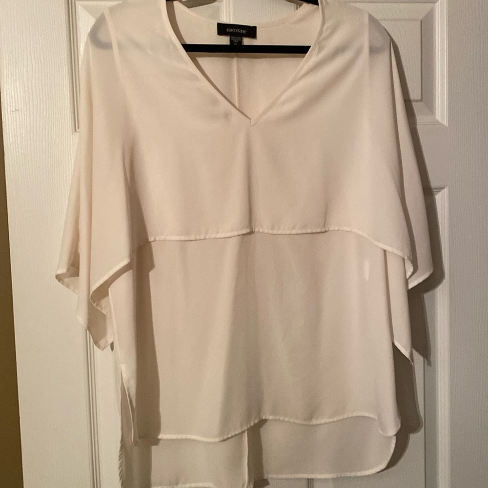This is a beautiful Karen Kane top, size XL, looks new.
